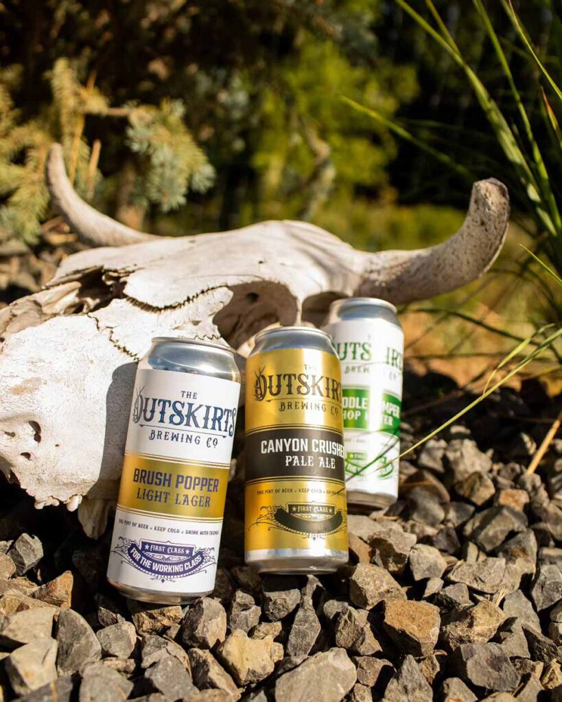 outskirts brewing co. brush popper light lager and canyon crusher american pale ale yakima