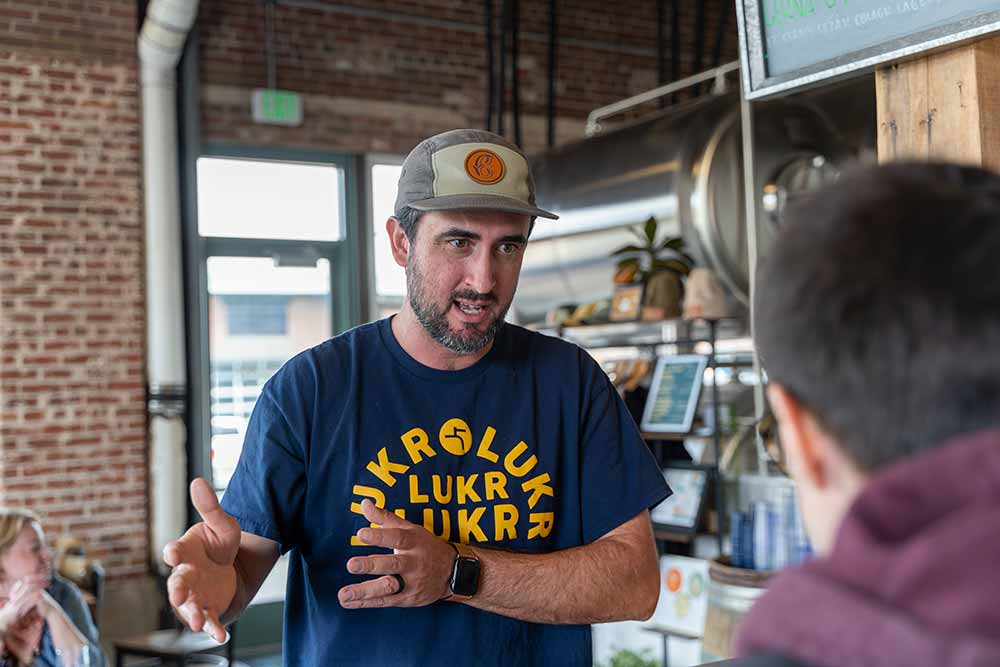 cohesion brewing co-founder eric larkin and hop culture senior content editor grace lee-weitz